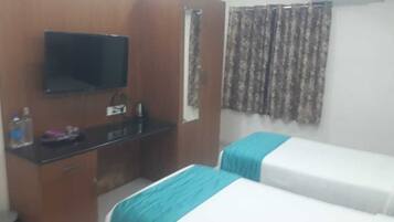 Deluxe Double or Twin Room, City View | 1 bedroom, desk, laptop workspace, free WiFi