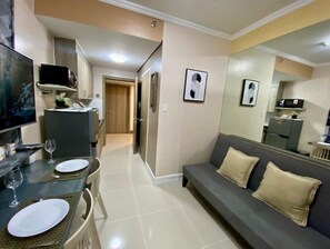 Living area - 
1 BR Fully Furnished Condo in Mandaluyong with Pool and Parking - Fame 1  2021 (Mandaluyong)