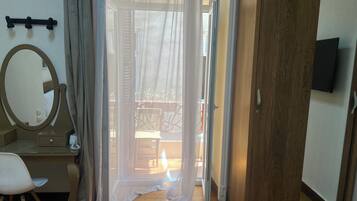 Deluxe Double Room, Balcony | Desk, laptop workspace, free WiFi