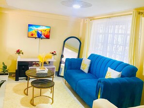 Apartament Deluxe, vistes a la ciutat | Sala d'estar