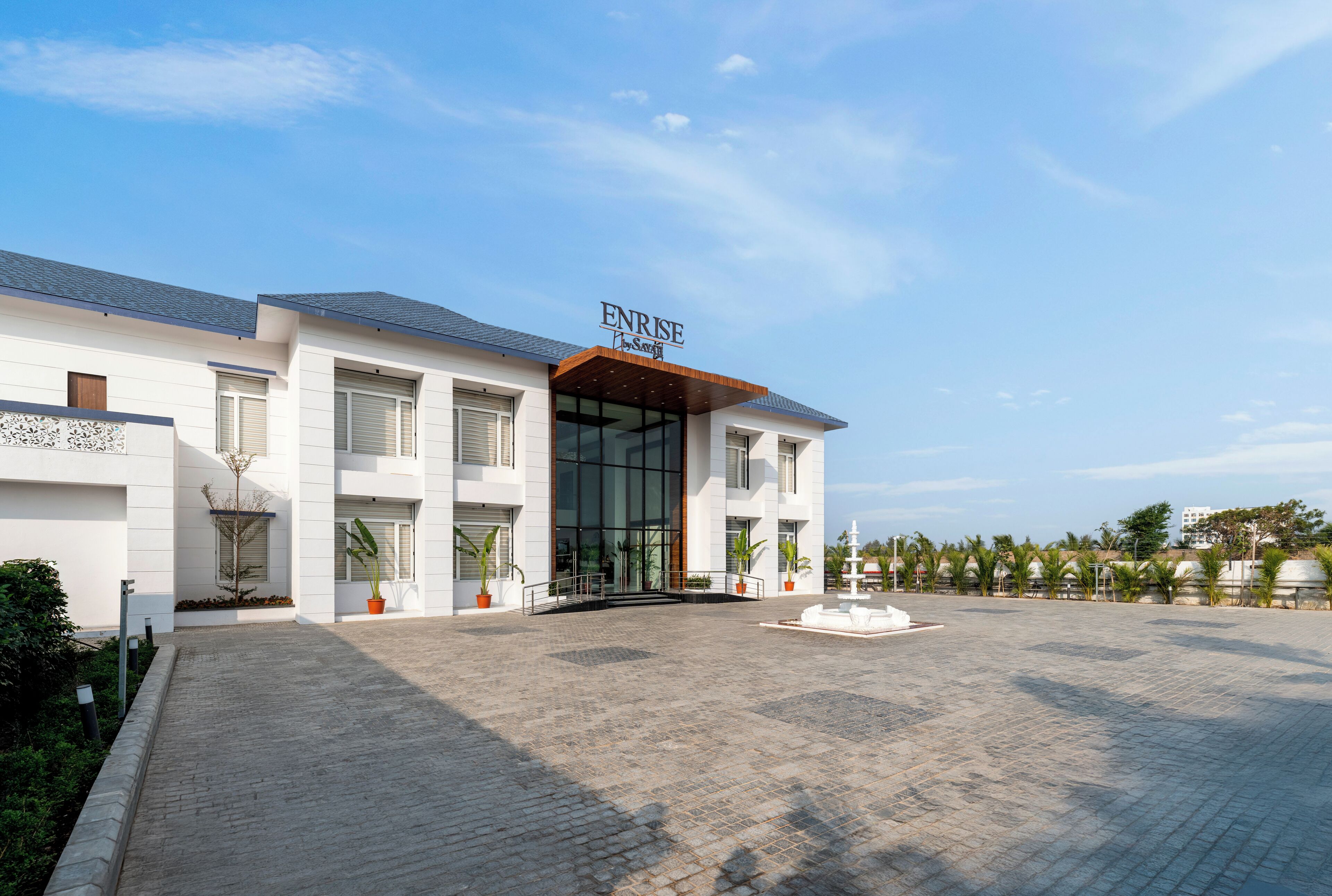 A modern building with a sign reading "ENRISE Spa".