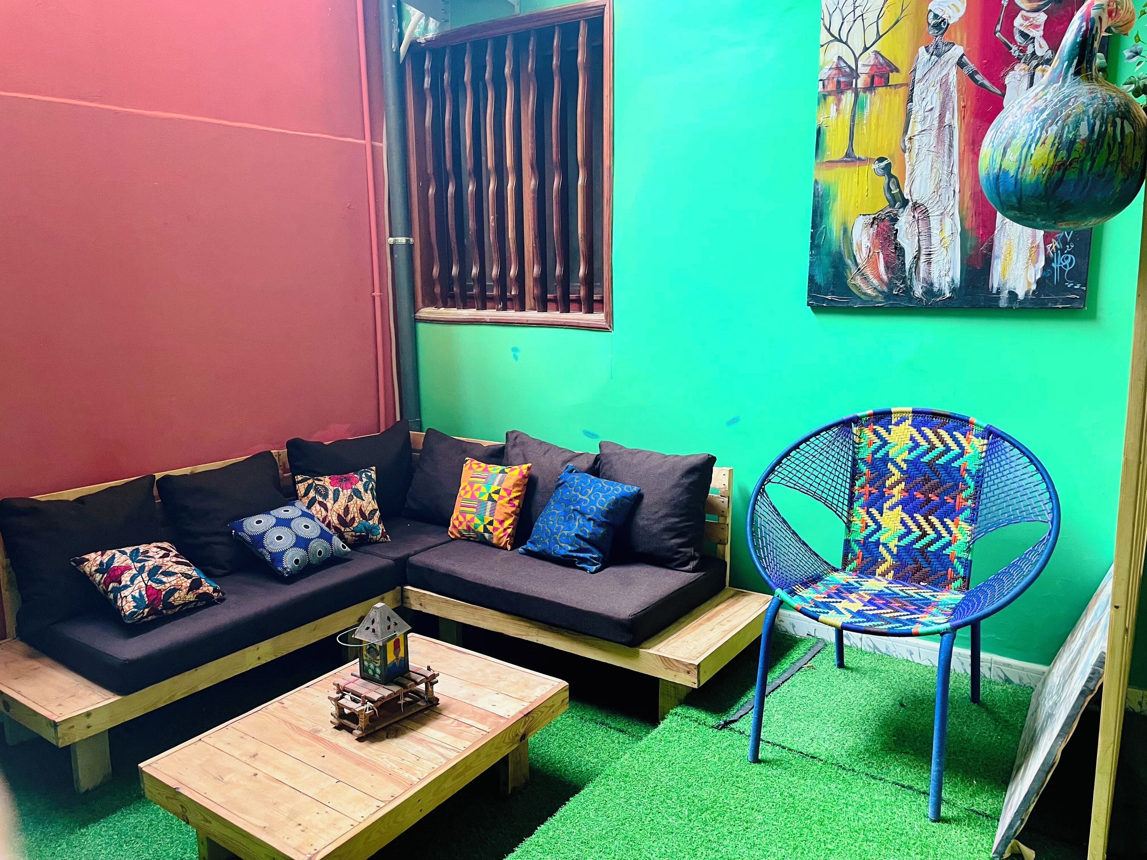 A cozy living area with a sofa, a chair, and a small wooden table.