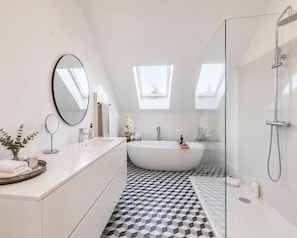 Shower, hair dryer, towels, soap