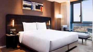 Suite ejecutiva, 1 cama King size | Cortinas blackout, insonorización, wifi gratis y ropa de cama