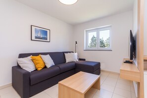 Appartement Prestige, 1 chambre, vue partielle sur la mer | Aire de séjour