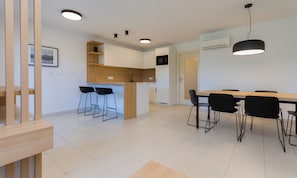 Appartement Prestige, 1 chambre, vue partielle sur la mer | Aire de séjour