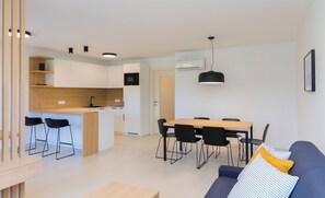 Appartement Prestige, 1 chambre, vue partielle sur la mer | Aire de séjour