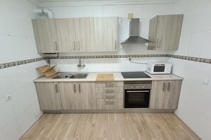 Private kitchen - Apartment Avenida next to the beach (Cadiz)