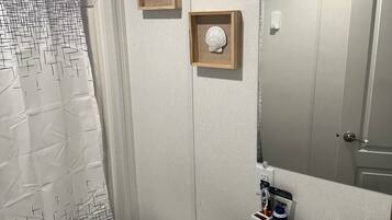 Hair dryer, towels, soap, toilet paper
