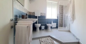 Apartment, Partial Sea View | Bathroom | Hair dryer, towels