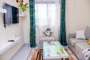 Apartment, 1 Bedroom, Balcony, Garden View | Room amenity