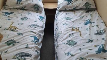 2 habitaciones y ropa de cama