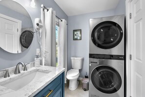 Hair dryer, towels, soap, toilet paper