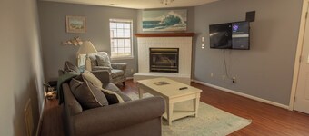 A quiet lakeside home for family, business, or both to relax or be productive.