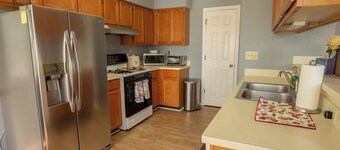 A quiet lakeside home for family, business, or both to relax or be productive.