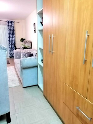24-inch Smart TV with digital channels - Lux Suites Capital Heights Apartments (Nairobi)
