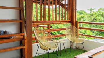 Deluxe Suite, Private Bathroom, Beach View | Desk, laptop workspace, soundproofing, free WiFi