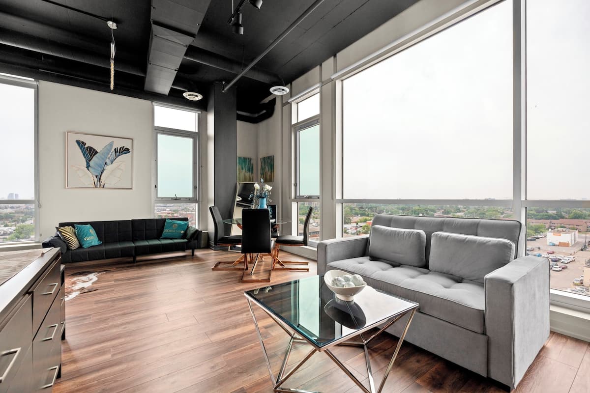 Deluxe Suite, Multiple Beds, Kitchen, City View | Living area
