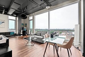 Deluxe Suite, Multiple Beds, Kitchen, City View | Living area | 46-inch flat-screen TV with satellite channels, Netflix, Hulu