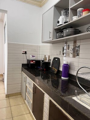 Appartement Deluxe, balcon, vue ville | Cuisine privée