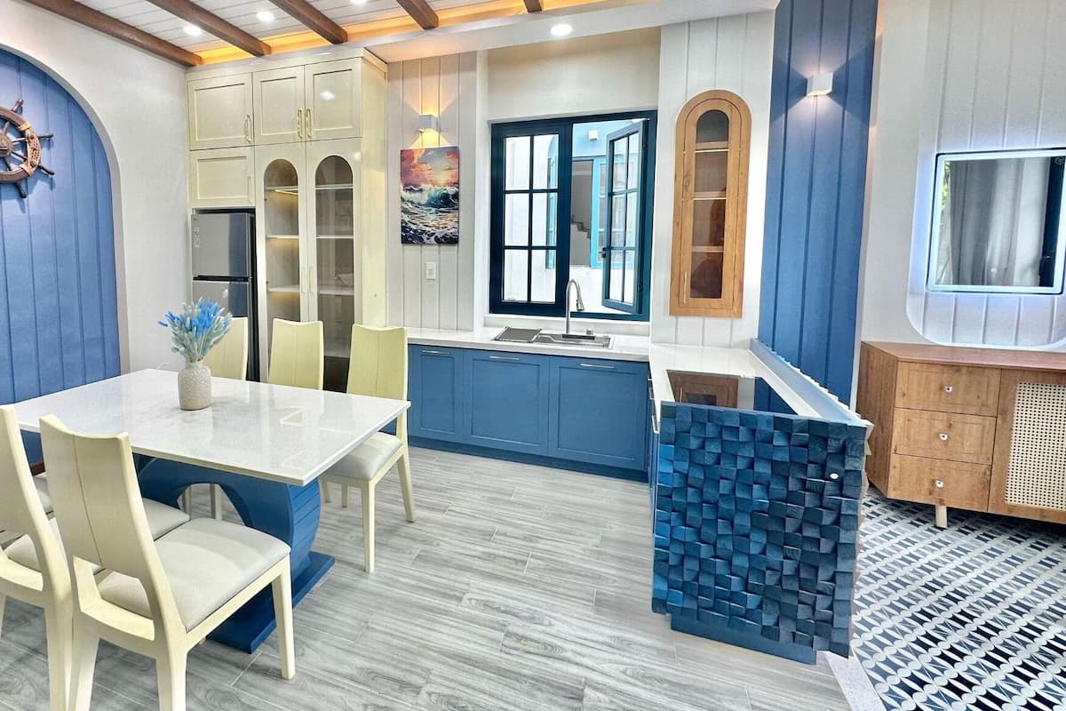 Deluxe Villa, 4 Bedrooms, Patio, Garden View | Living area | 35-inch LCD TV with cable channels