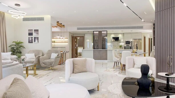 A modern living room with a marble floor, white sofas, and a central coffee table. - Luxurious 3 bedrooms with Private Sauna & Jacuzzi in the prestigious Korba,Cairo (Cairo Governorate)