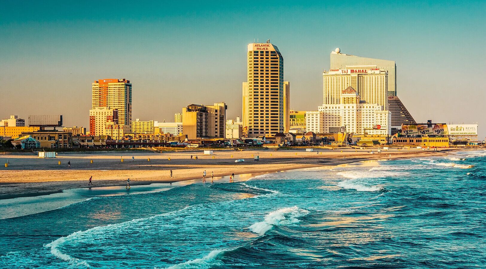 A coastal cityscape with prominent buildings including the Atlantic Palace and Taj Mahal hotels.