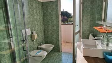 Standard Room | Bathroom | Shower, hair dryer, towels, soap
