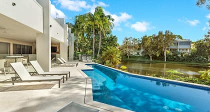 Villa 8 The Lakes moments from pristine beaches, world-class golf courses, and the stunning Mt. Cool