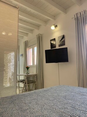 1 habitación, tabla de planchar con plancha, wifi gratis y ropa de cama 