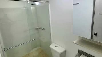 Shower, towels, soap, toilet paper
