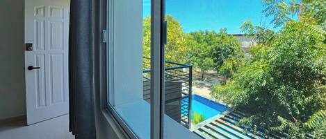 Apartment, 1 Bedroom, Pool View | 1 bedroom, iron/ironing board, free WiFi