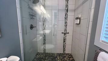 Shower, eco-friendly toiletries, hair dryer, towels