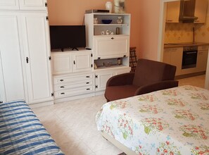 Tabla de planchar con plancha, Internet, ropa de cama