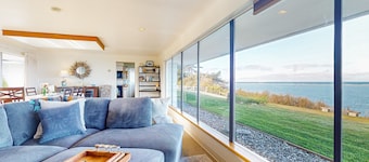 Waterfront home with bay and mountain views, beach access, fireplace
