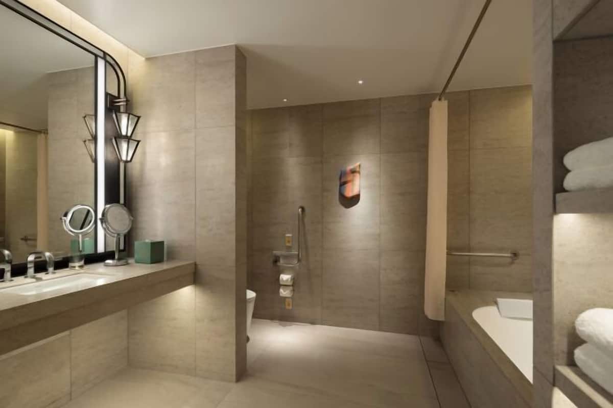 Bathroom | Separate tub and shower, free toiletries, hair dryer, bathrobes