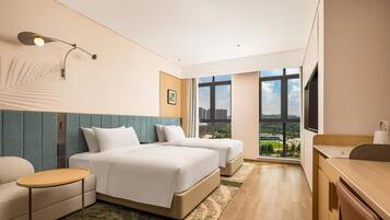 Down comforters, pillowtop beds, laptop workspace, blackout drapes