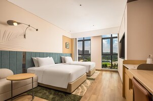 Down comforters, pillowtop beds, laptop workspace, blackout drapes