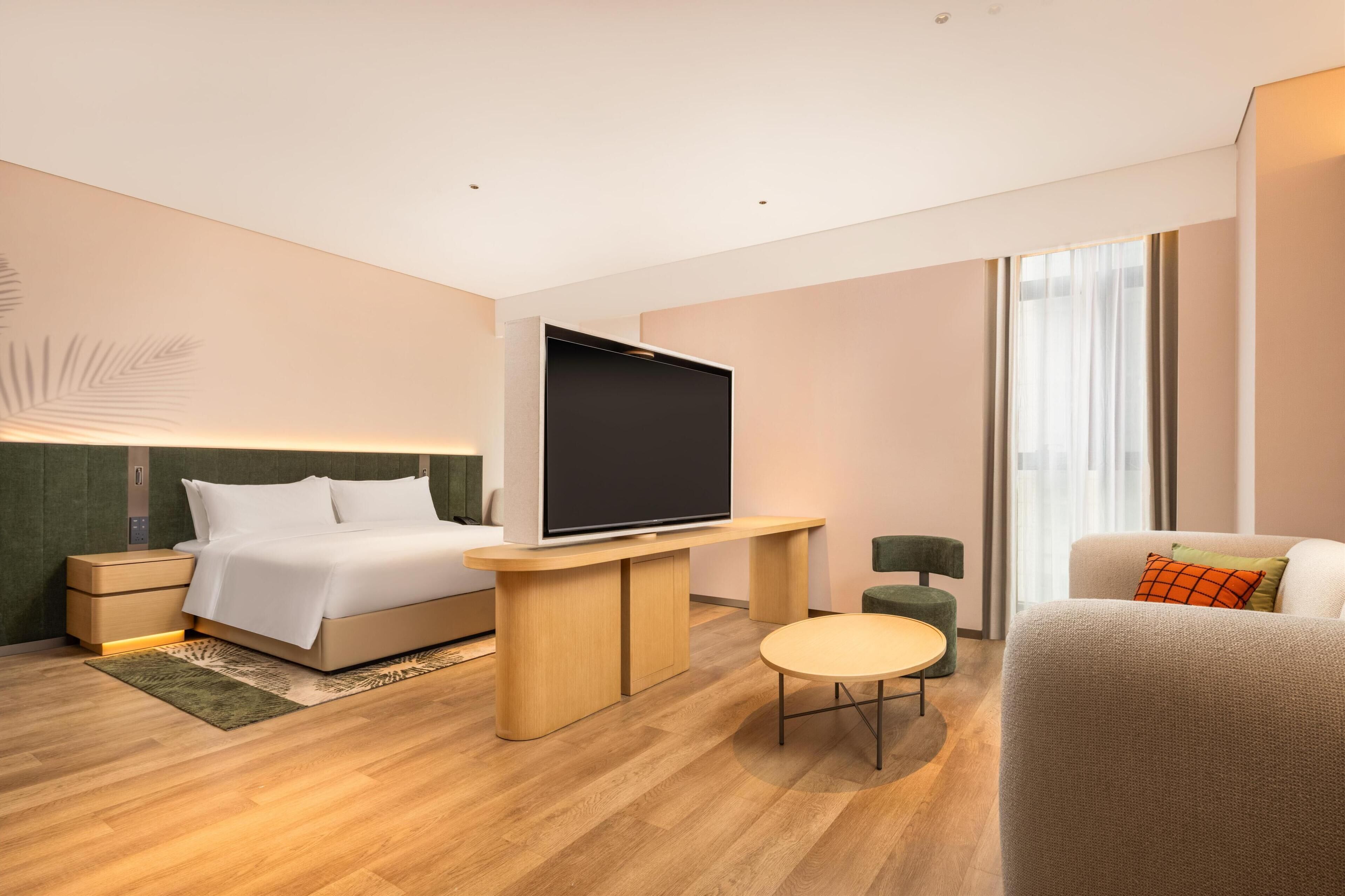 Family Room, 1 King Bed | Living area | 65-inch TV with cable channels