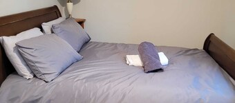 Reasonably large room with luxurious bathroom and a fitted kitchen