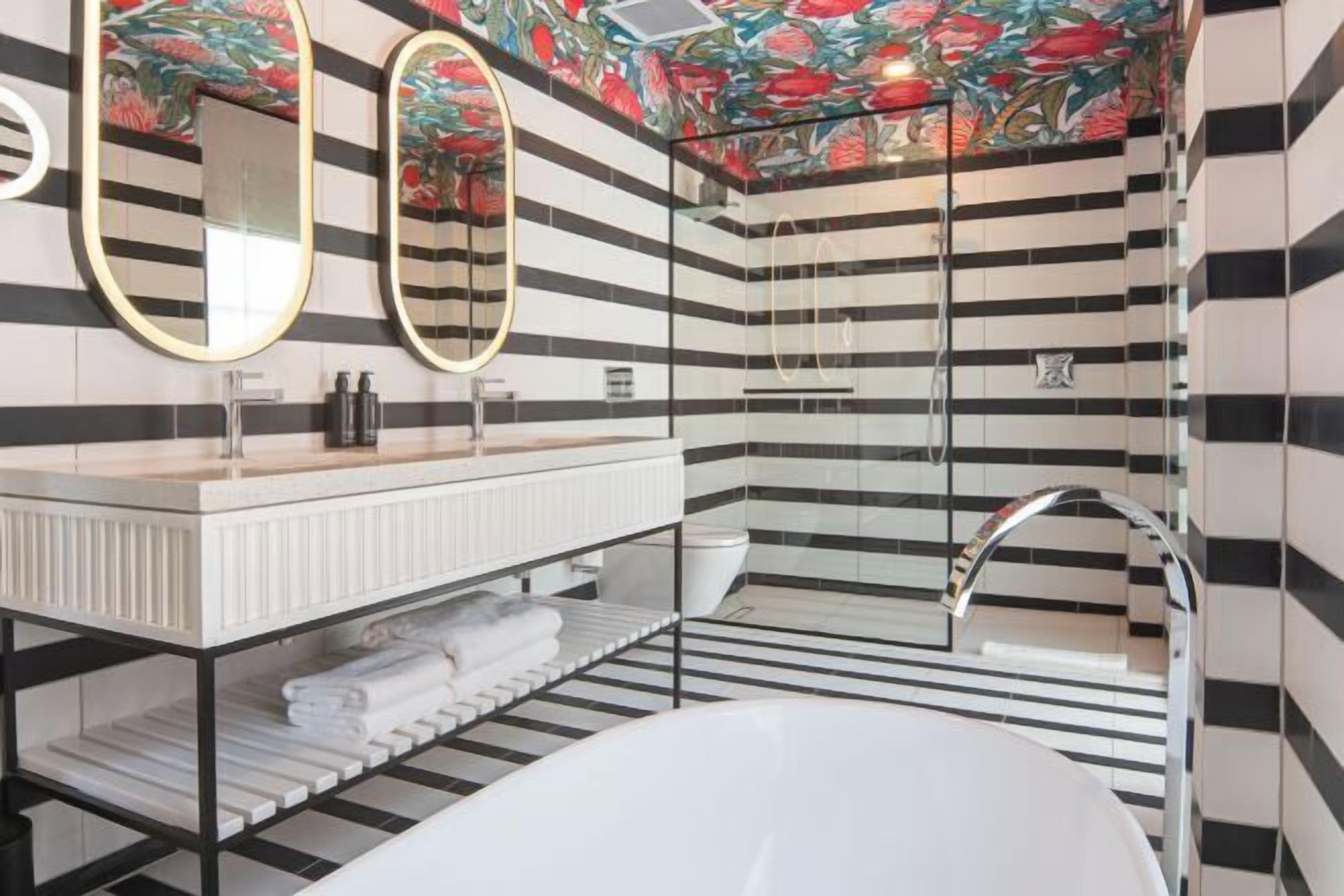 Bathroom | Hair dryer, slippers, towels, soap