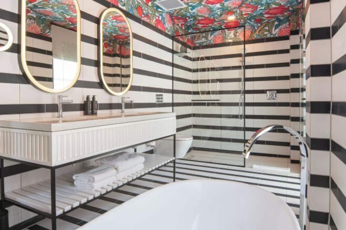 Bathroom | Hair dryer, slippers, towels, soap