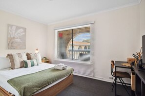 2 bedrooms, desk, iron/ironing board, travel cot