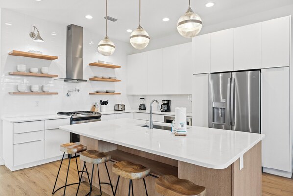 Deluxe Townhome, Partial Ocean View | Private kitchen - Take it Easy by Book That Condo (Panama City Beach)