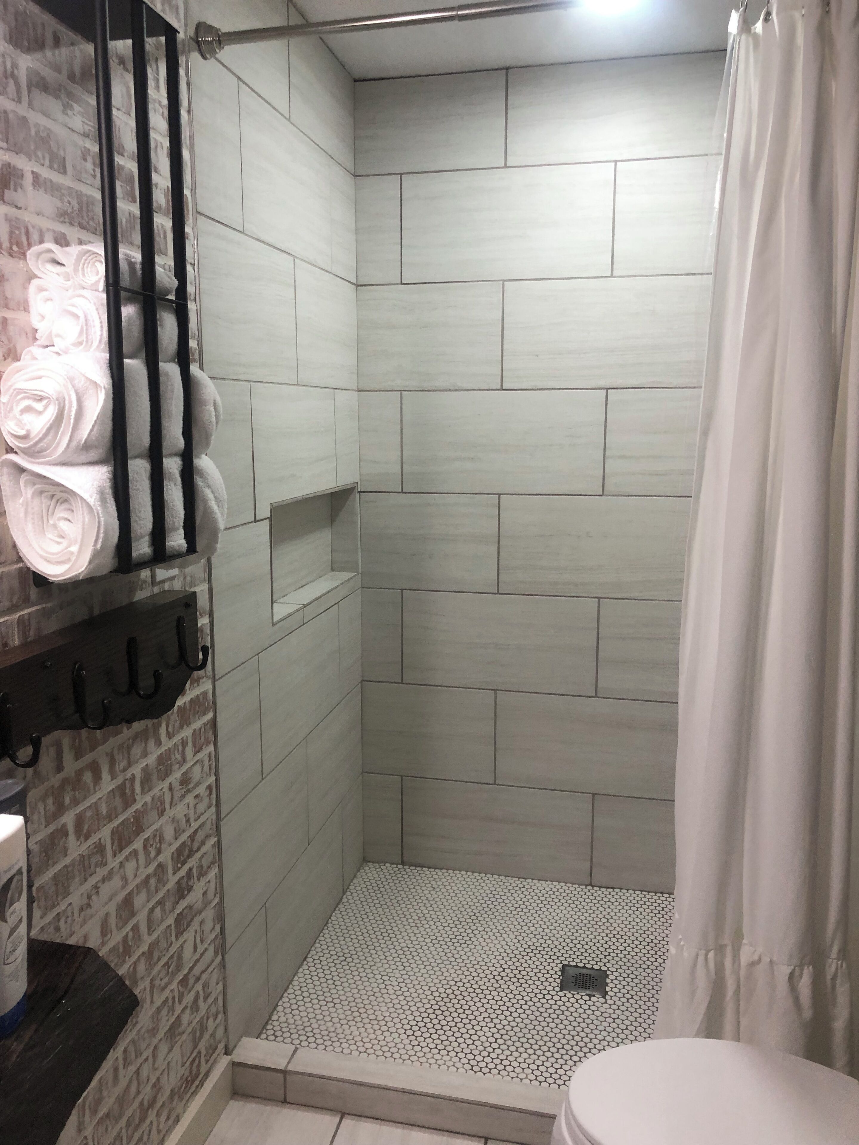 Shower, towels, toilet paper