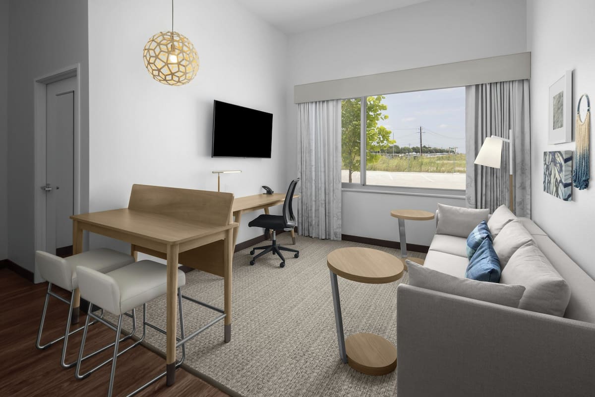 Executive Suite, 1 Bedroom | Living area | 55-inch Smart TV with cable channels, Netflix, streaming services