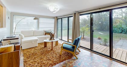 Walk to downtown at this charming home with bikes, wifi, and cornhole