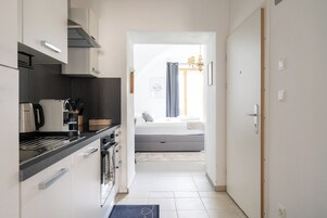 Family Apartment, Multiple Beds, Non Smoking, Kitchen | Private kitchen | Fridge, oven, stovetop, dishwasher