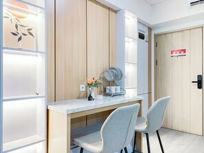 Apartamento Deluxe | Comedor