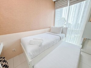 Deluxe Apartment | 2 bedrooms, desk - Restful And Simple 2Br At The Via And The Vue Apartment (Surabaya)